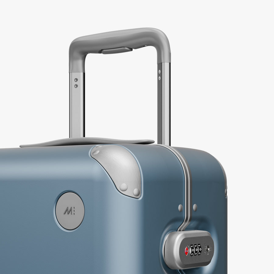 Elemental Blue | Luggage handle view of Hybrid Carry-On in Elemental Blue