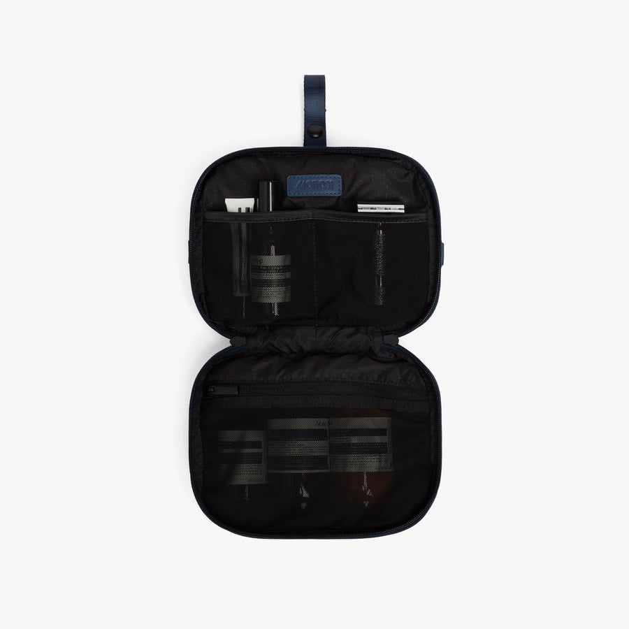 Oxford Blue | Open front view of Metro Hanging Toiletry Case in Oxford Blue