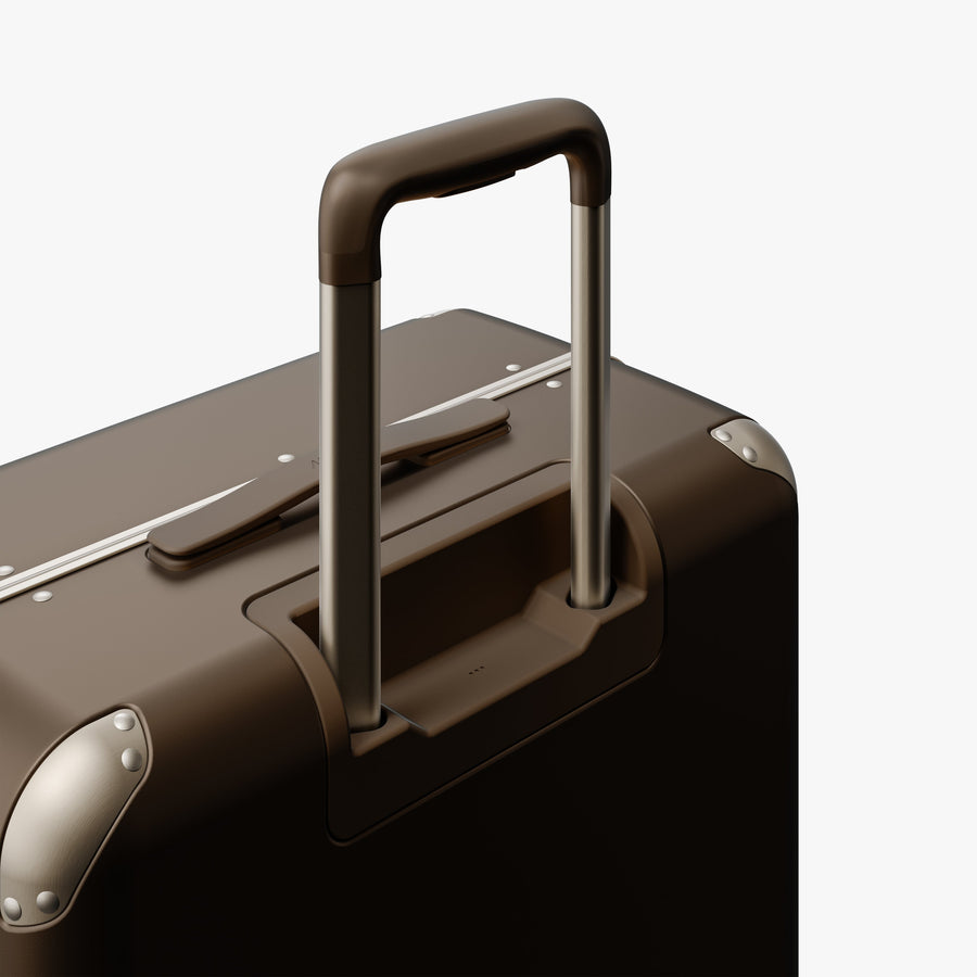 Adobe Brown | Extended luggage handle view of Hybrid Check-In Medium in Adobe Brown