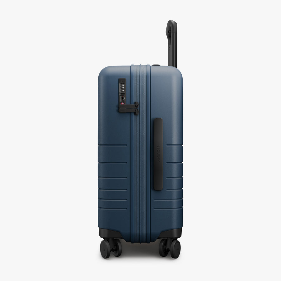 Ocean Blue | Side view of Expandable Carry-On in Ocean Blue
