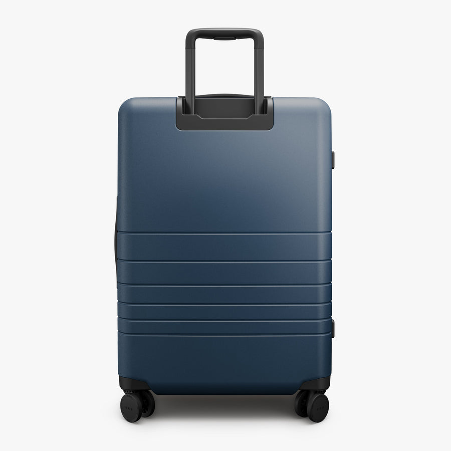 Ocean Blue | Back view of Expandable Check-In Medium in Ocean Blue