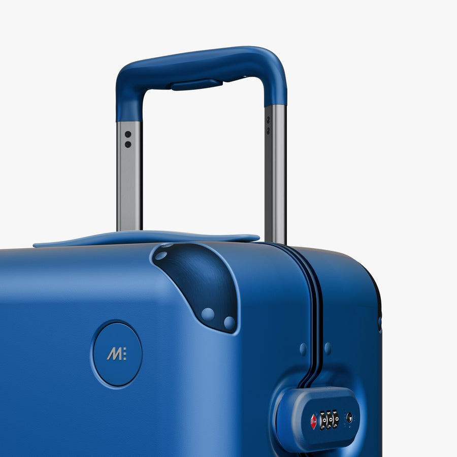 Coastal Blue | Close-up view of the logo detail on the Hybrid Carry-On in Coastal Blue