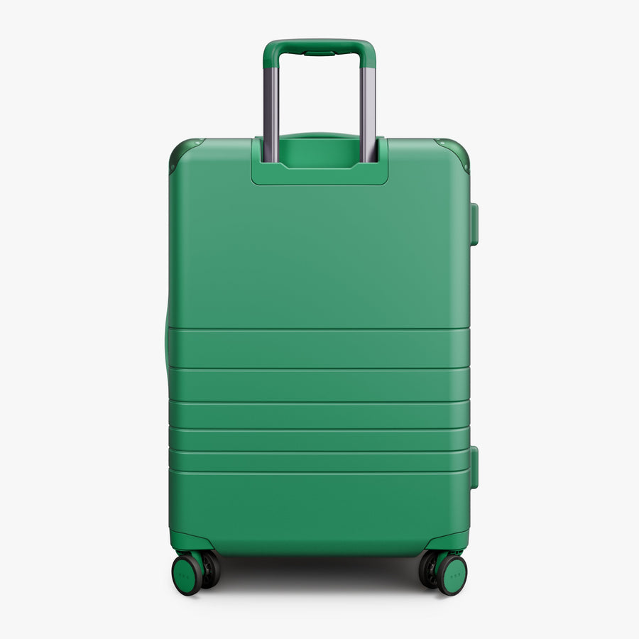 Jungle Green | Back view of the Hybrid Check-In Medium in Plus Jungle Green