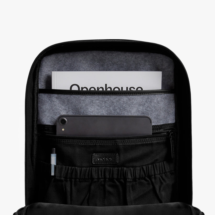 Carbon Black (Vegan Leather) | Inside view of Metro Backpack Carbon Black