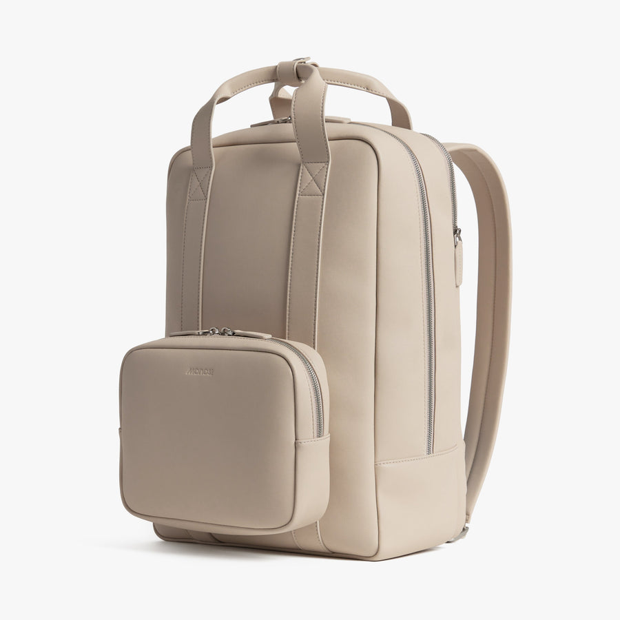 Ivory (Vegan Leather) | Angled view of Metro Backpack in Ivory