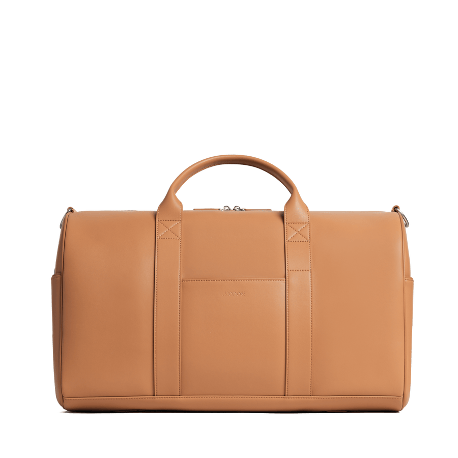 Saddle Tan (Vegan Leather) Scaled | Front view of Metro Carry-All Duffel  Saddle Tan