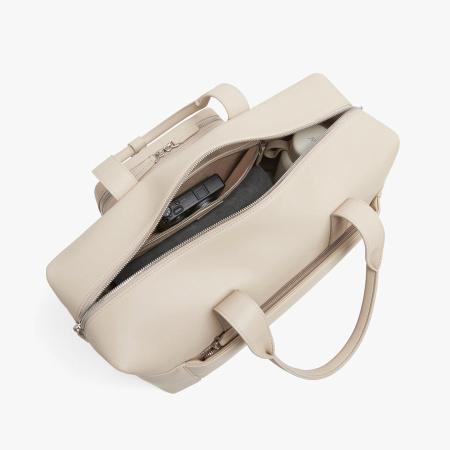 Ivory (Vegan Leather) | Front Interior view of Metro Duffel in Ivory