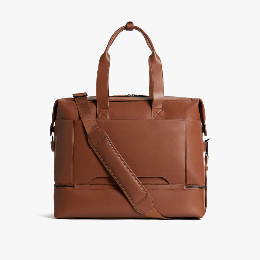 Mahogany (Vegan Leather) | Back view with strap of Metro Weekender in Mahogany