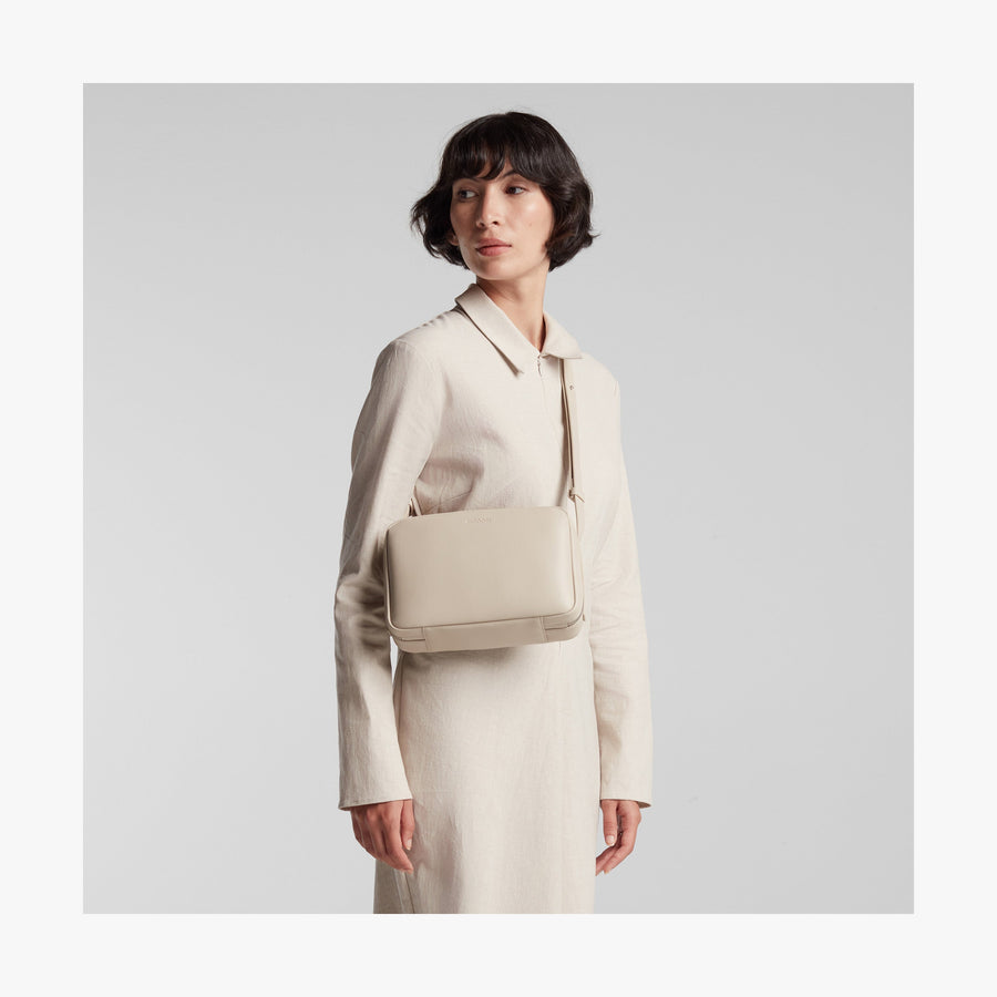 Ivory (Vegan Leather) | Angled view of Metro Crossbody in Ivory