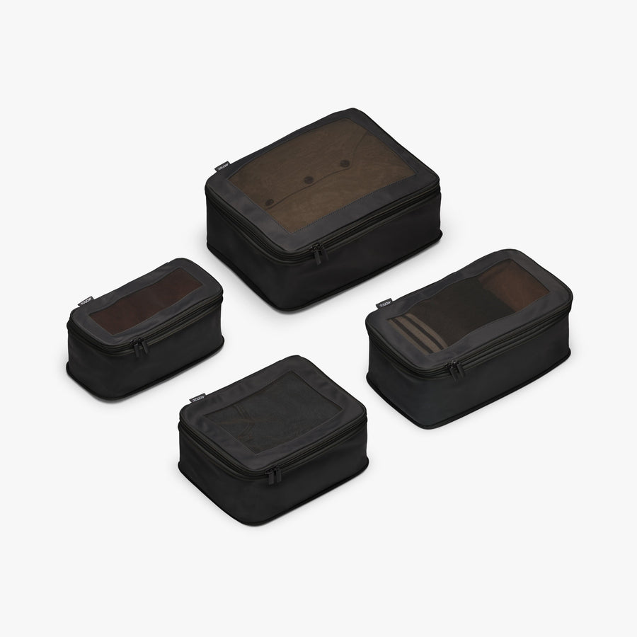Set of Four / Black | This is a photo of a set of four compressible packing cubes in black