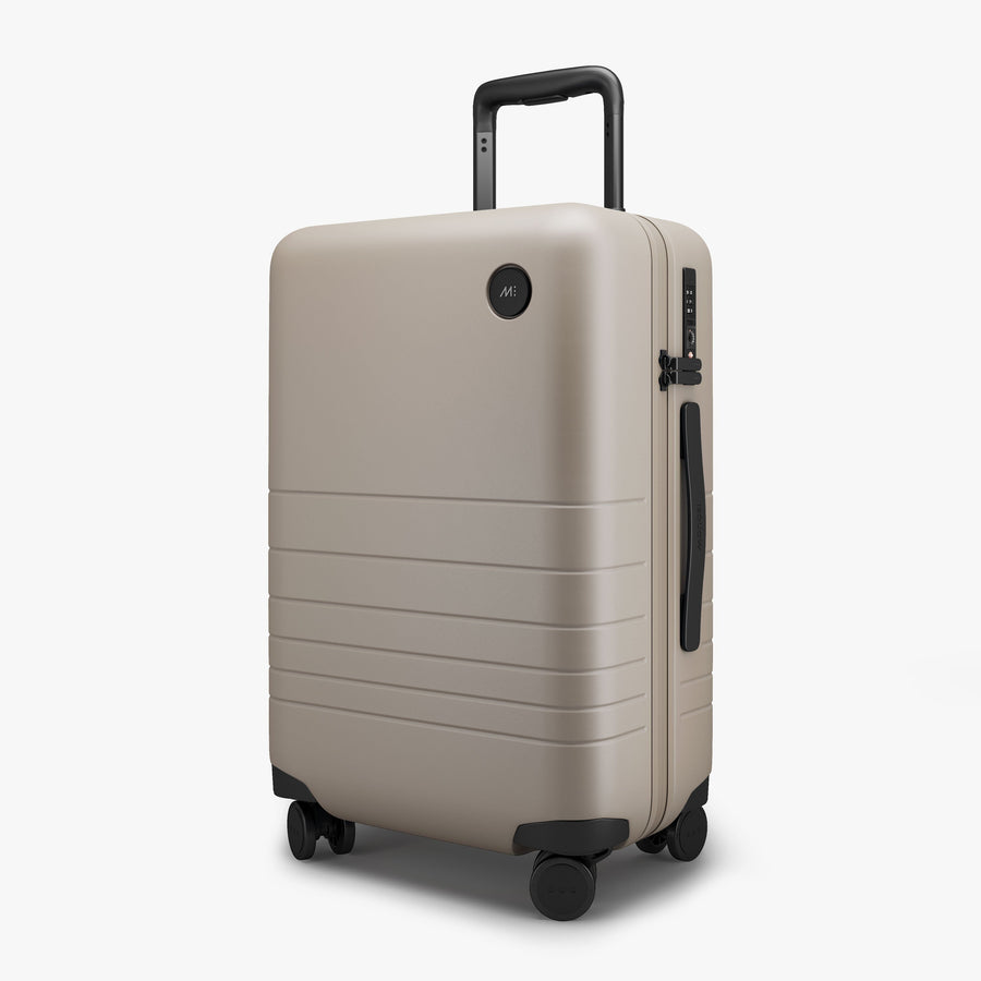 Desert Taupe | Angled view of Carry-On Plus in Desert Taupe