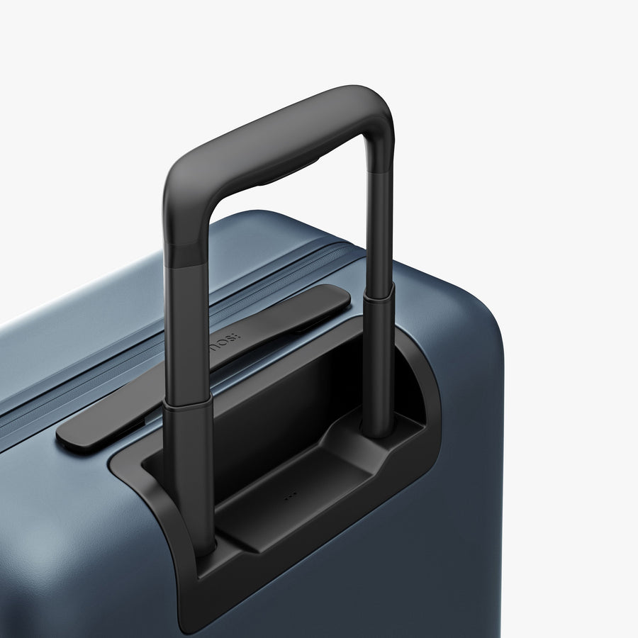 Ocean Blue | Extended luggage handle view of Carry-On Pro in Ocean Blue