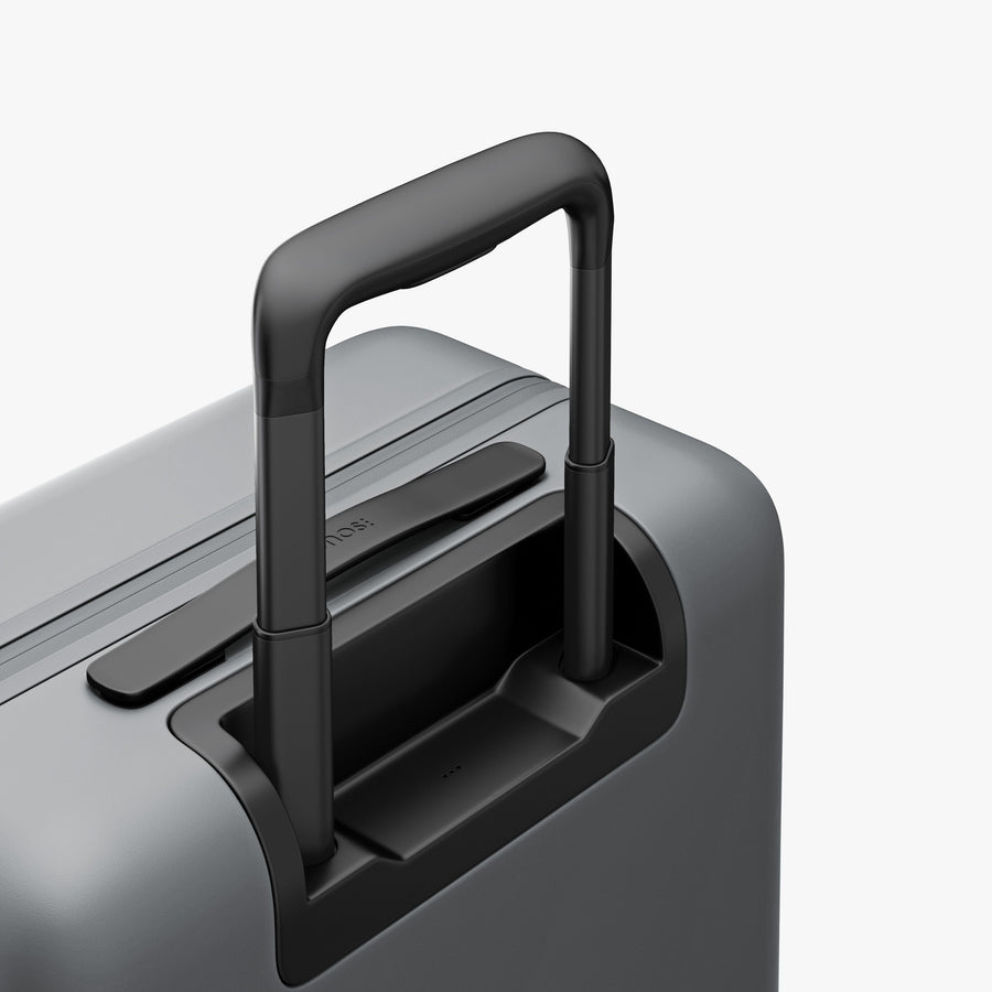 Storm Grey | Extended luggage handle view of Carry-On Pro Plus in Storm Grey