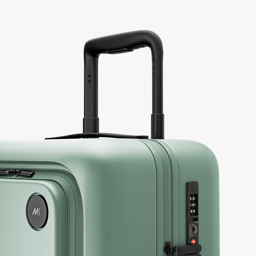 Sage Green | Luggage handle view of Carry-On Pro Plus in Sage Green