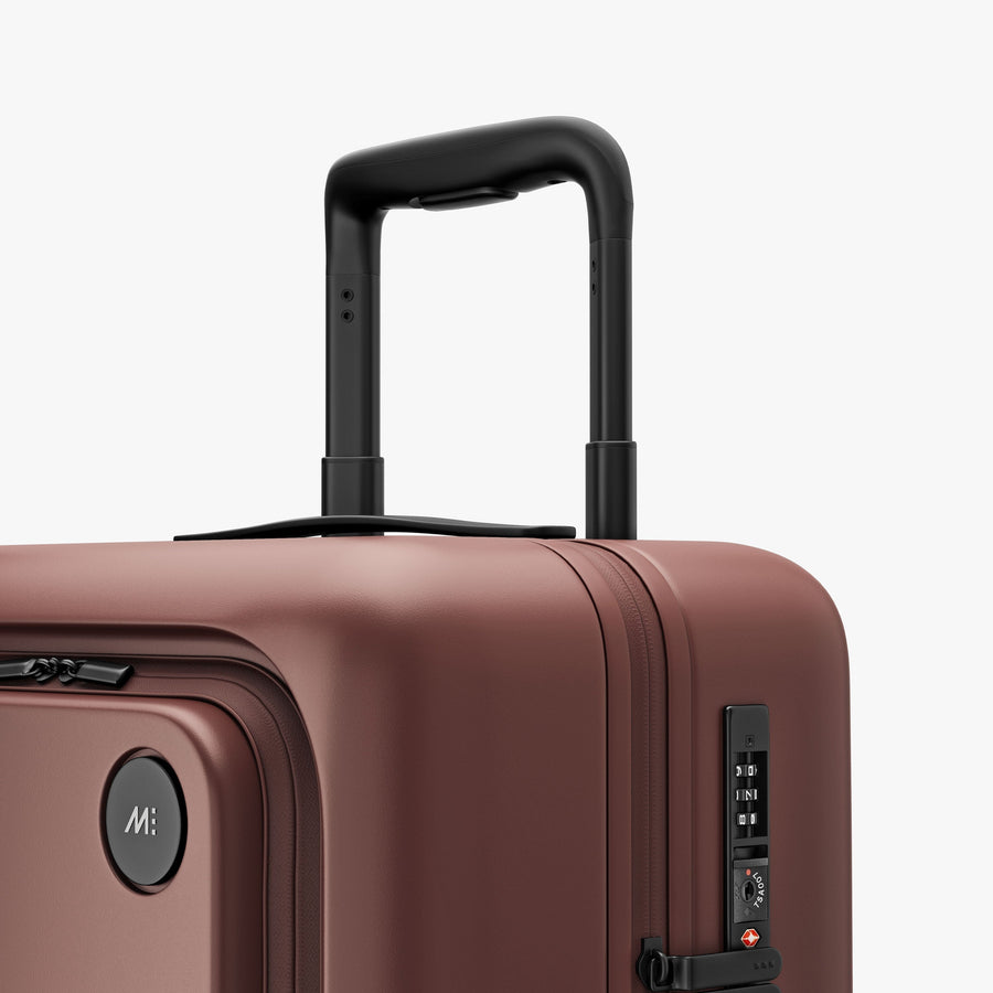 Terracotta | Luggage handle view of Carry-On Pro in Terracotta