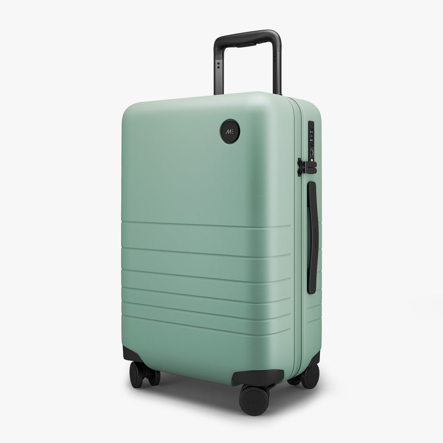 Sage Green | Angled view of Carry-On Plus in Sage Green