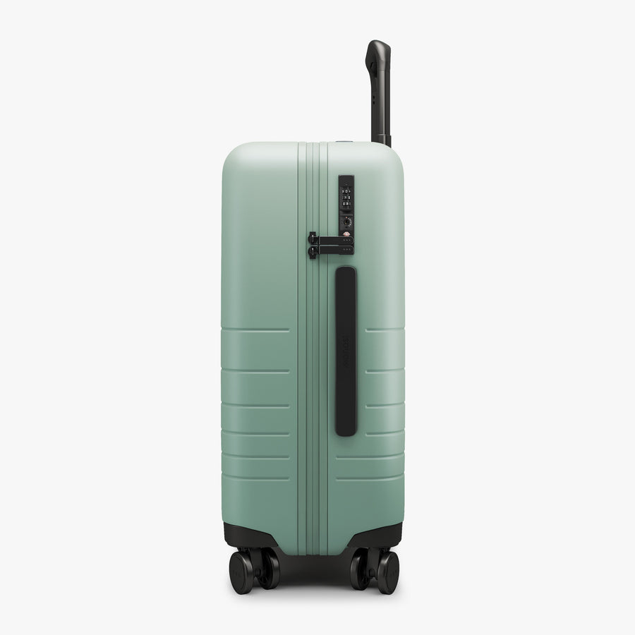 Sage Green | Side view of Carry-On Plus in Sage Green