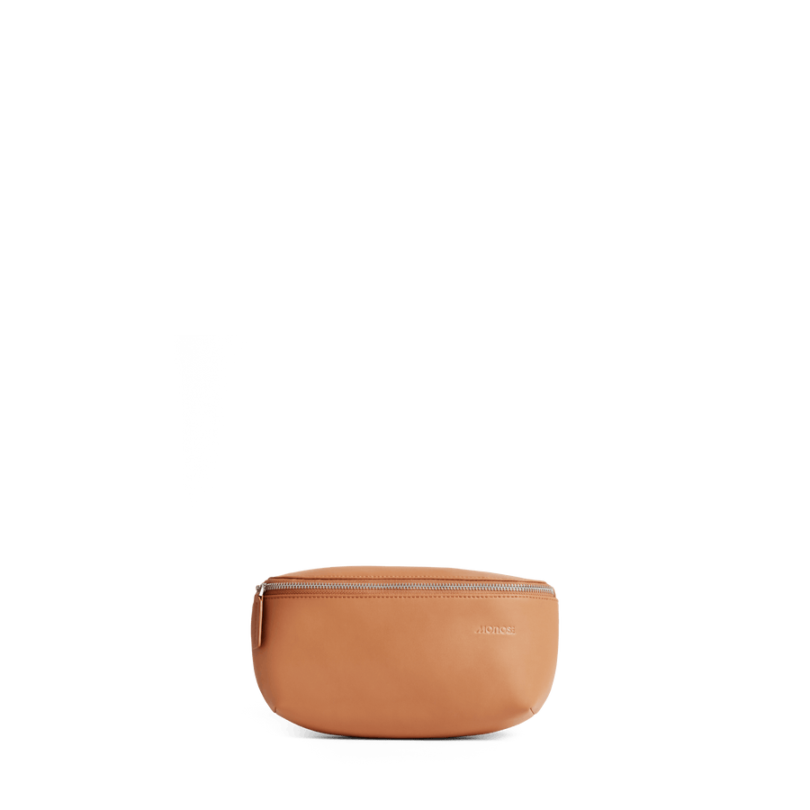 Saddle Tan (Vegan Leather) Scaled | Front view of Metro Sling in Saddle Tan