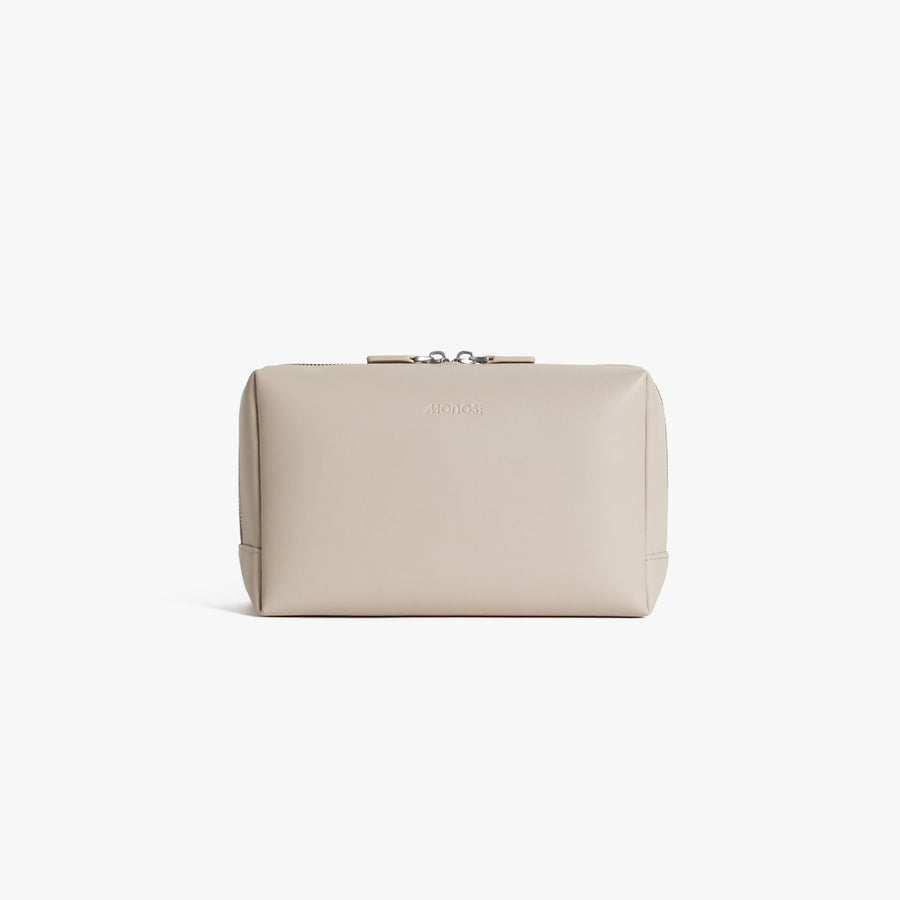 Large / Ivory (Vegan Leather) | Front view of Metro Toiletry Case Large in Ivory