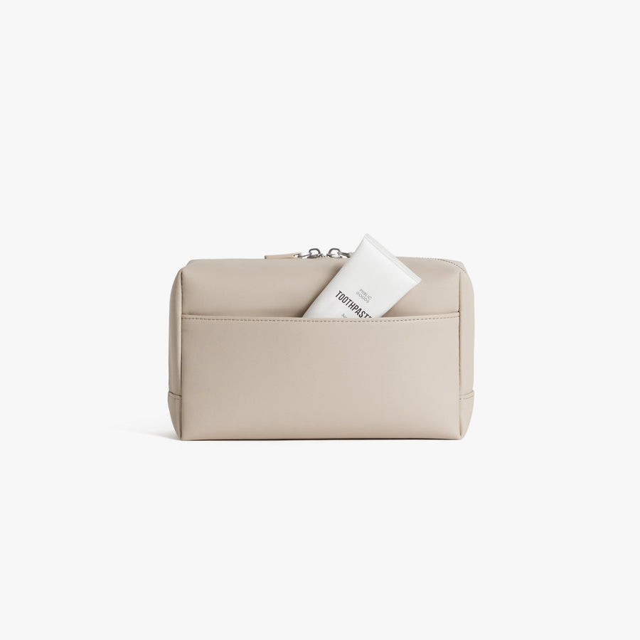 Large / Ivory (Vegan Leather) | Back view showing pocket of Metro Toiletry Case Large in Ivory