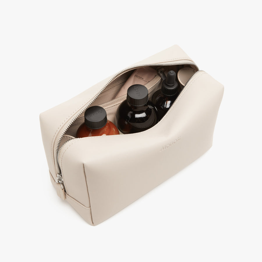Large / Ivory (Vegan Leather) | Interior front view of Metro Toiletry Case Large in Ivory