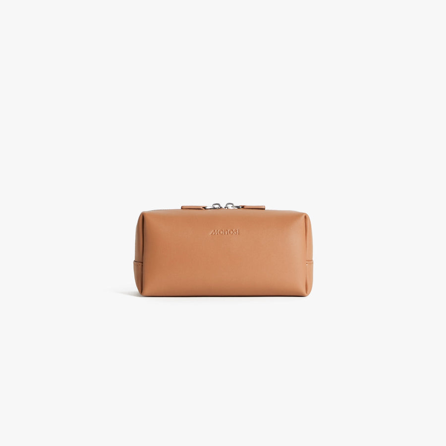 Small / Saddle Tan (Vegan Leather) | Front view of Metro Toiletry Case Small in Saddle Tan